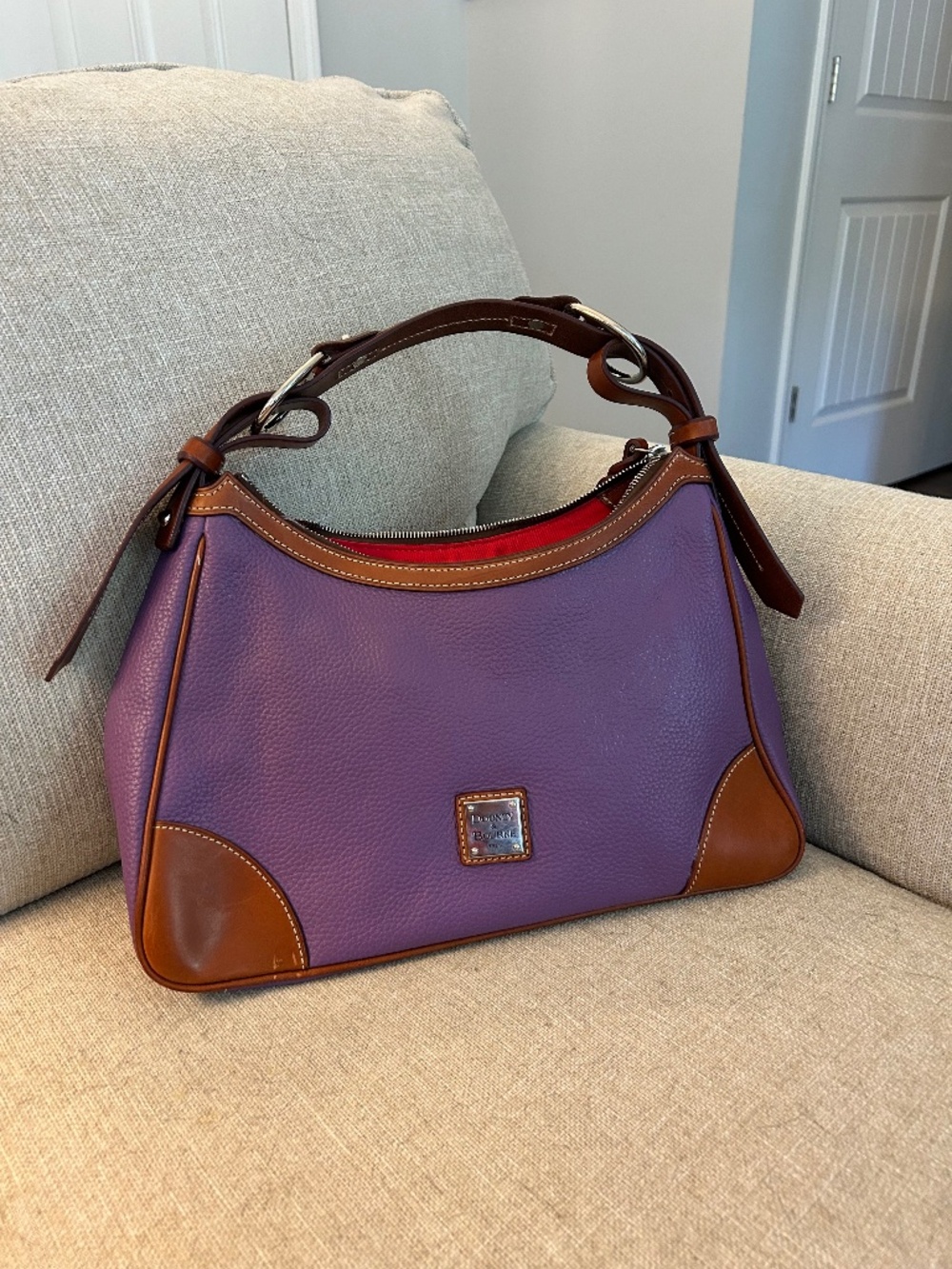 A Dooney Bourke pebbled leather bag.